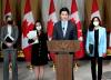 Justin Tang - THE CANADIAN PRESS
Prime Minister Justin Trudeau is joined by Minister of Foreign Affairs Melanie Joly, left, Deputy Prime Minister and Minister of Finance Chrystia Freeland, and Minister of National Defence Anita Anand, right, as he speaks on the situation in Ukraine.
