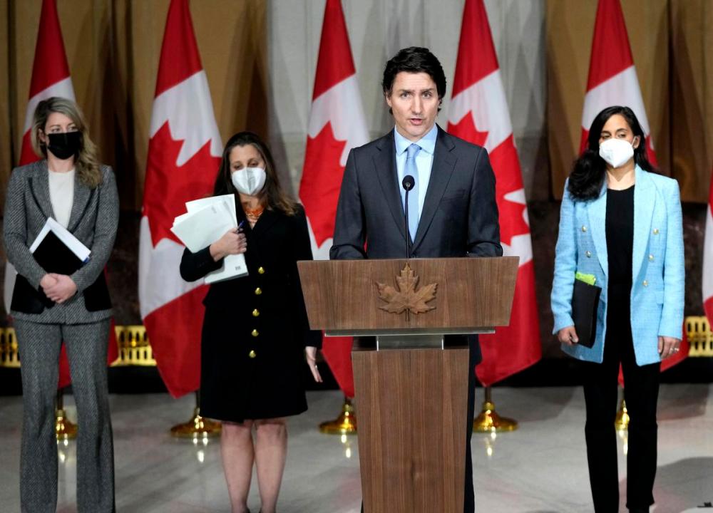 Justin Tang - THE CANADIAN PRESS
Prime Minister Justin Trudeau is joined by Minister of Foreign Affairs Melanie Joly, left, Deputy Prime Minister and Minister of Finance Chrystia Freeland, and Minister of National Defence Anita Anand, right, as he speaks on the situation in Ukraine.