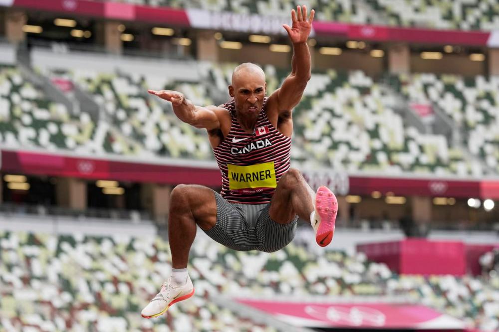 David J. Phillip - The Associated Press
Damian Warner led all decathletes with a long jump of 8.24 metres Wednesday, a distance that would have earned bronze in the men’s long-jump competition earlier in the week.