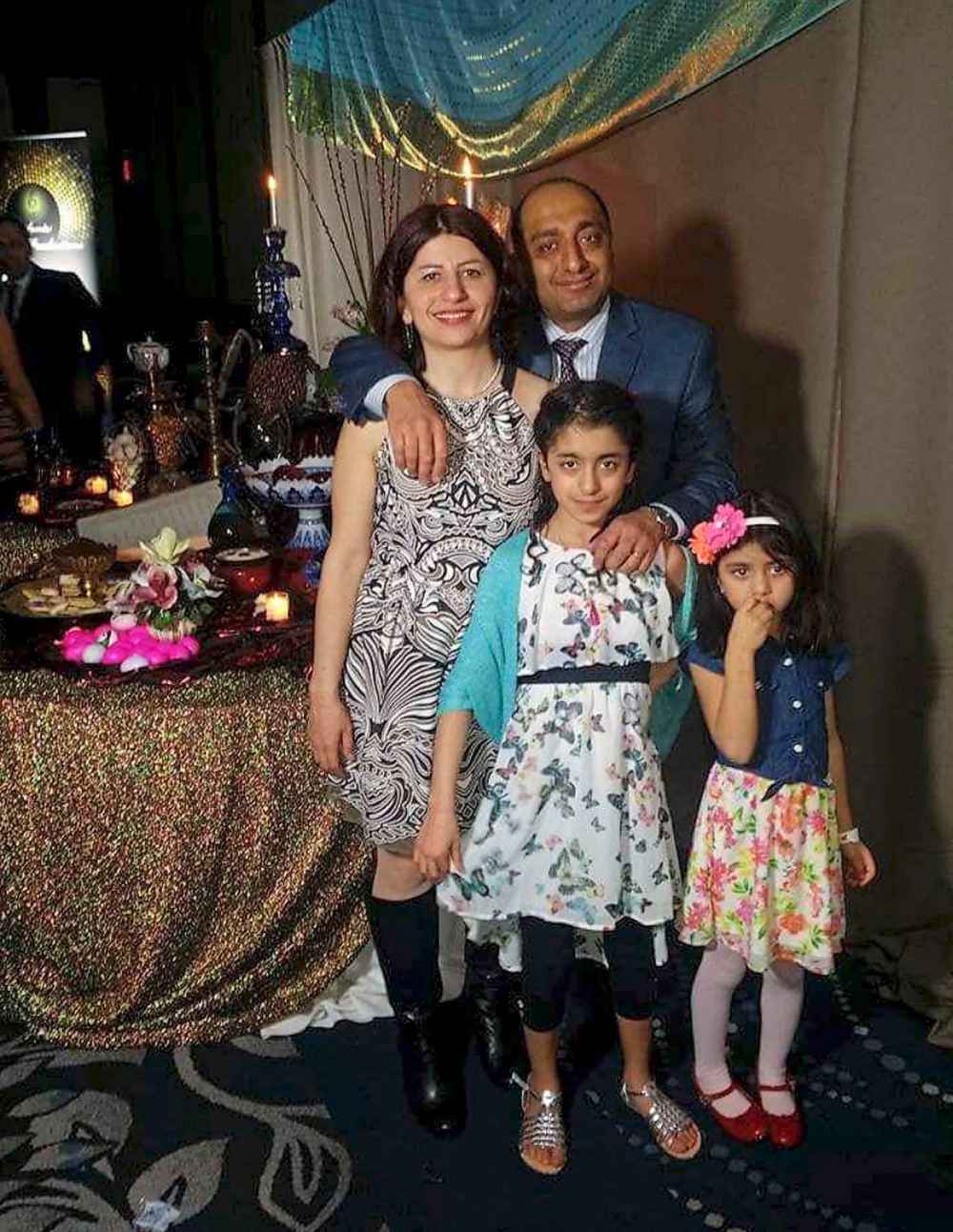 Mojgan Daneshmand (left) and Pedram Mousavi, University of Manitoba grads and professors at the University of Alberta, were killed in the crash along with their daughters Daria and Dorina. (Twitter)