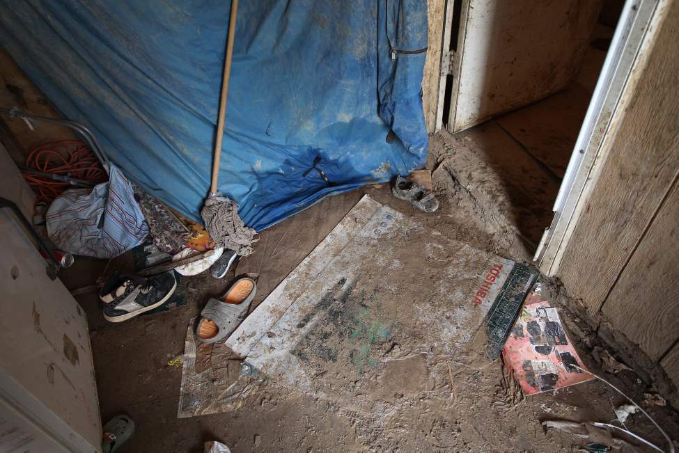 Filthy floors and rotting walls are a grim reality for the 13 people who call Richard Andrews' rundown trailer home.
(JOE BRYKSA / WINNIPEG FREE PRESS)