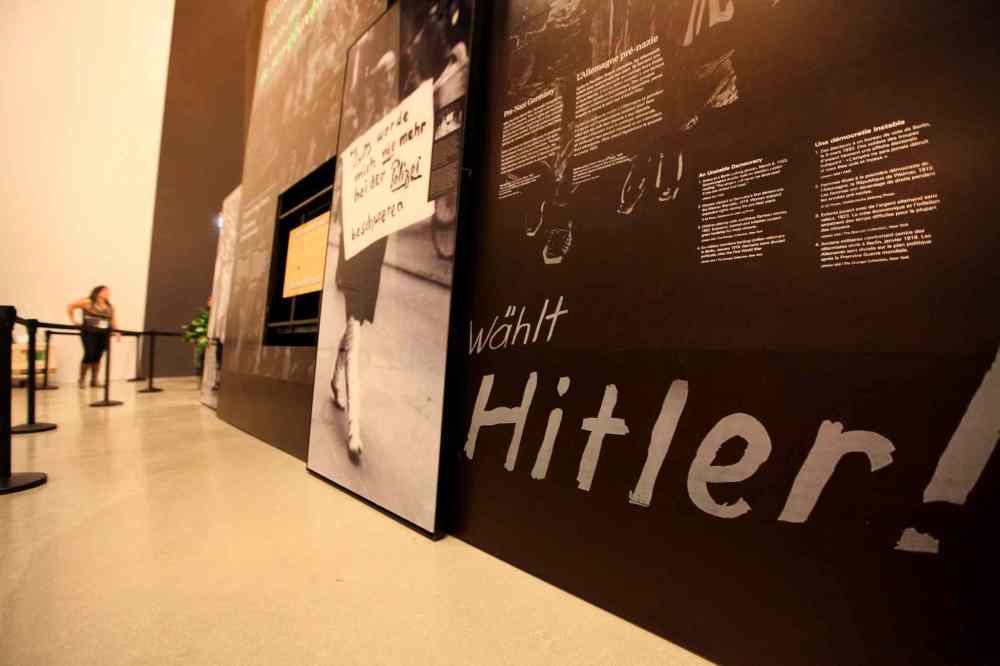 Ruth Bonneville / Winnipeg Free Press
Examining the Holocaust installation, with exhibits on death marches, genocide of groups and maps of Auschwitz, among others.