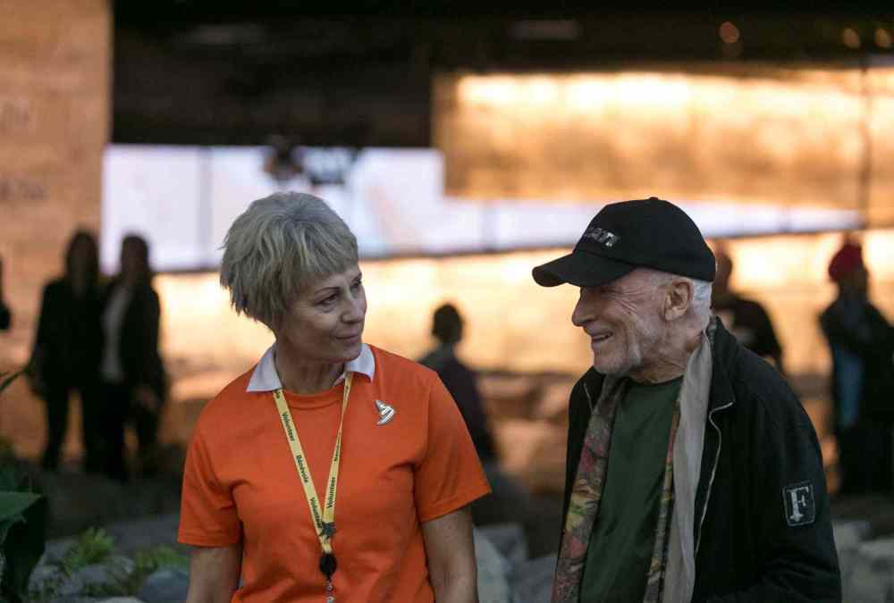 Melissa Tait / Winnipeg Free Press
Antoine Predock (right) the architect of the the Canadian Museum for Human Rights laughs with a volunteer on Saturday during free public previews. Thousands had reserved tickets for the four gallery preview tour on Saturday and Sunday. That is only four of 11 galleries, the rest of which open Sept. 27.
