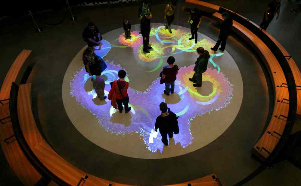 Melissa Tait / Winnipeg Free Press
Visitors try out the lights of inclusion game in the Canadian Journeys gallery at the Canadian Museum for Human Rights on Saturday. Thousands had reserved tickets for the four gallery preview tour on Saturday and Sunday. That is only four of 11 galleries, the rest of which open Sept. 27.