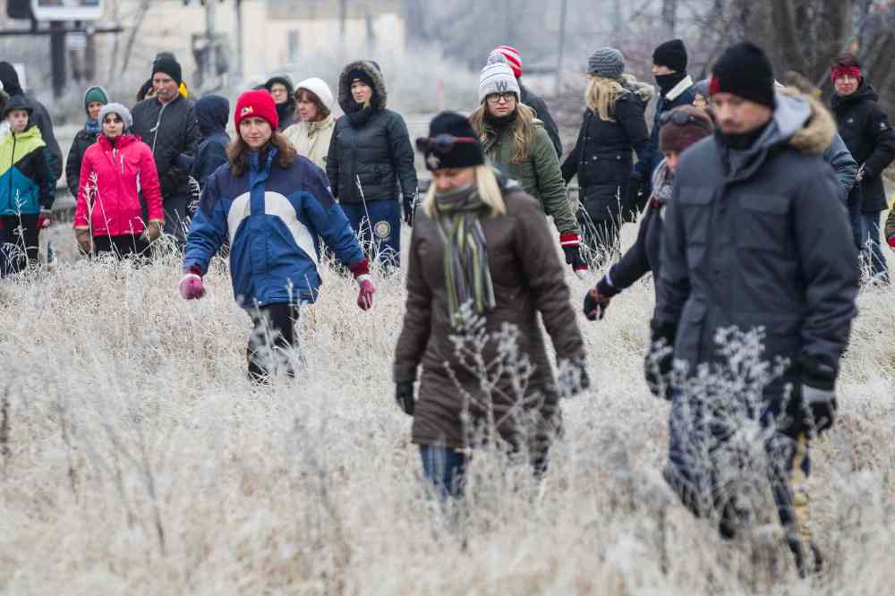 MIKE DEAL / WINNIPEG FREE PRESS
MIKE DEAL / WINNIPEG FREE PRESS
Hundreds of volunteers showed up to help in the ground search for College Beliveau teacher Kevin Dilk who went missing last Wednesday.
The search started in two locations along the train tracks at Thibault Street and the brush behind the Robins Coffee shop at Provencher Blvd and Des Meurons Street along the Seine River.
161127 - Sunday November 27, 2016