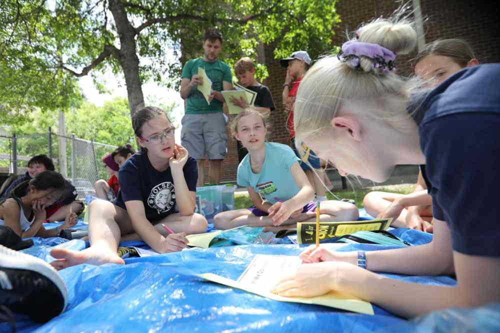 Students read outside.