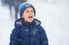 Elliott Smith, 4, catches snowflakes on his tongue. (Mikaela MacKenzie / Winnipeg Free Press)
