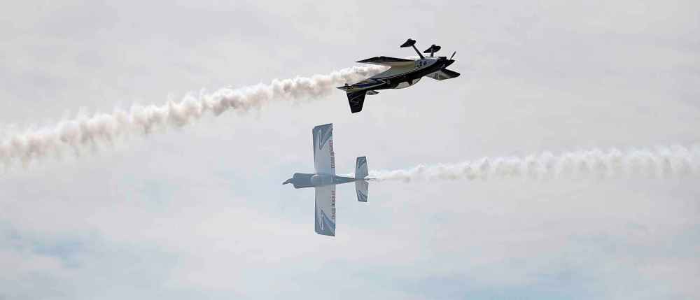 Team Rocket's Eric Hanson and Ken Fowler go through some manoeuvres during the airshow.