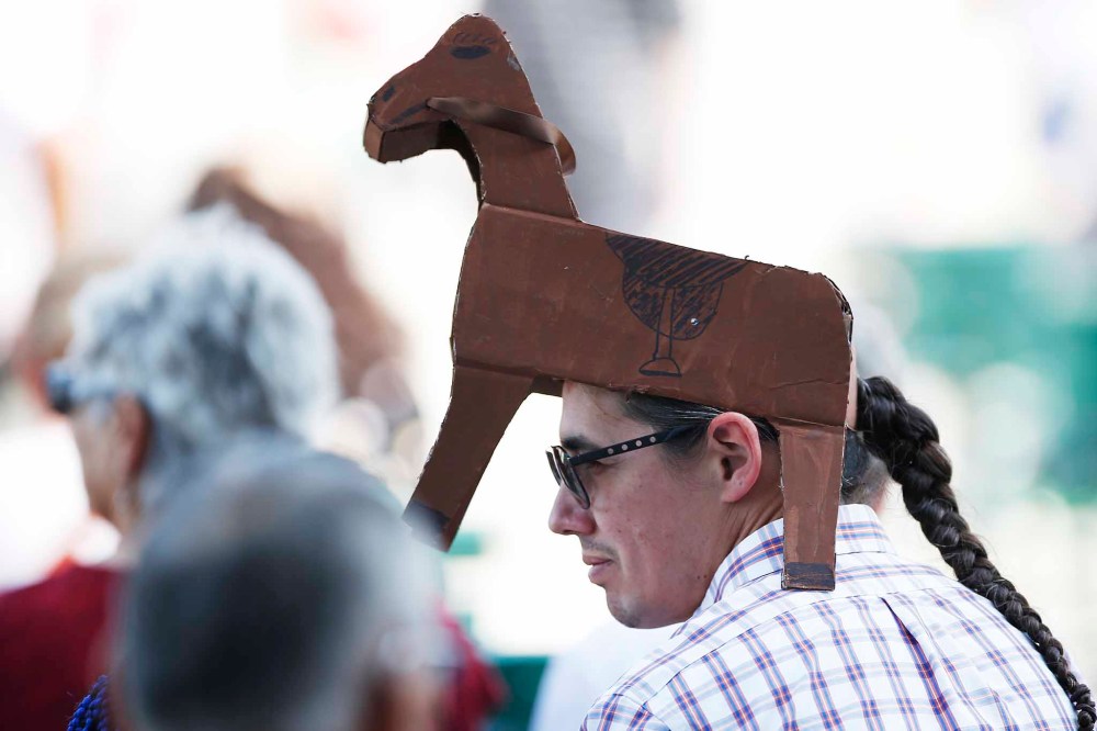 MP Robert-Falcon Ouellette wears a hat with an equine theme.