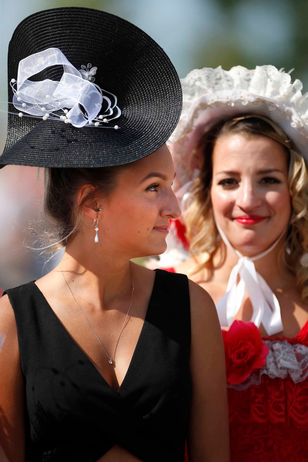 Nikee Musey wears an elegant fascinator.