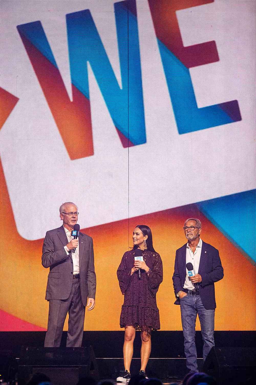 Hartley Richardson (left), CEO and president of James Richardson & Sons with We Day host Chloe Wilde (centre) and Bob Silver (right), president of Western Glove Works and general partner of FP Canadian Newspapers Limited Partnership