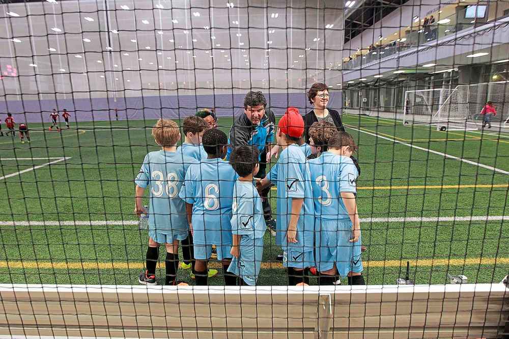 PHIL HOSSACK / WINNIPEG FREE PRESS
U9 Boys Winnipeg Phoenix FC Head Coach gives half-time instructions to his team. The match ended in a tie with Winnipeg South End United SC 4-4.
Annual Golden Boy Tournament opened at the U of W's Axworthy Health and Rec Plex Thursday evening.
February 14, 2019.