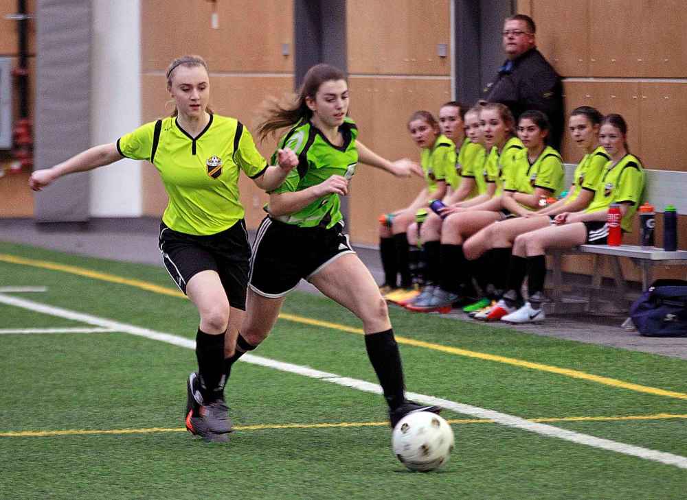 PHIL HOSSACK / WINNIPEG FREE PRESS
U15 Girls Charleswood Youth SA's Grace Samyn fends off Tyndall Park CC's Nataya Dias. CYSA won the match 1-0.
