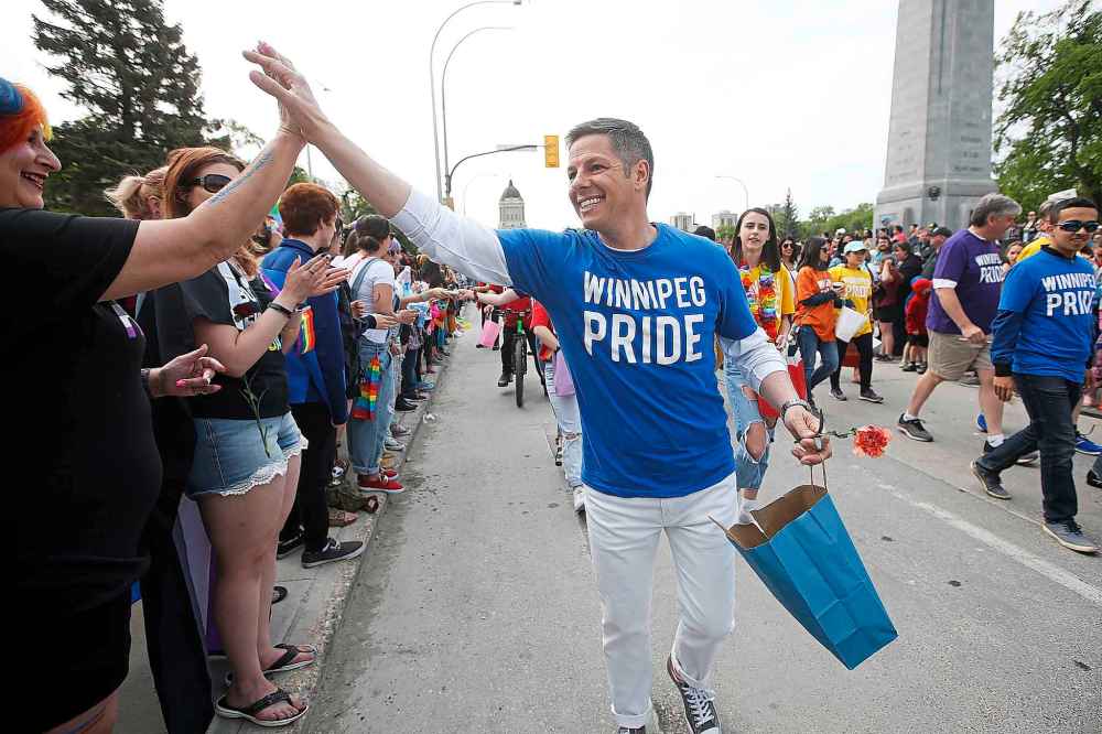 Mayor Brian Bowman takes part in Pride parade in Winnipeg Sunday, June 2, 2019.