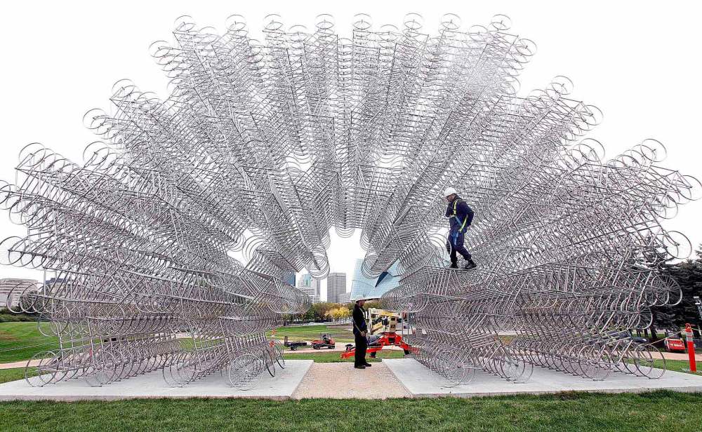 PHIL HOSSACK / WINNIPEG FREE PRESS
Workers put the finishing touches on Ai Weiwei's Forever Bicycles at The Forks on Thursday afternoon.