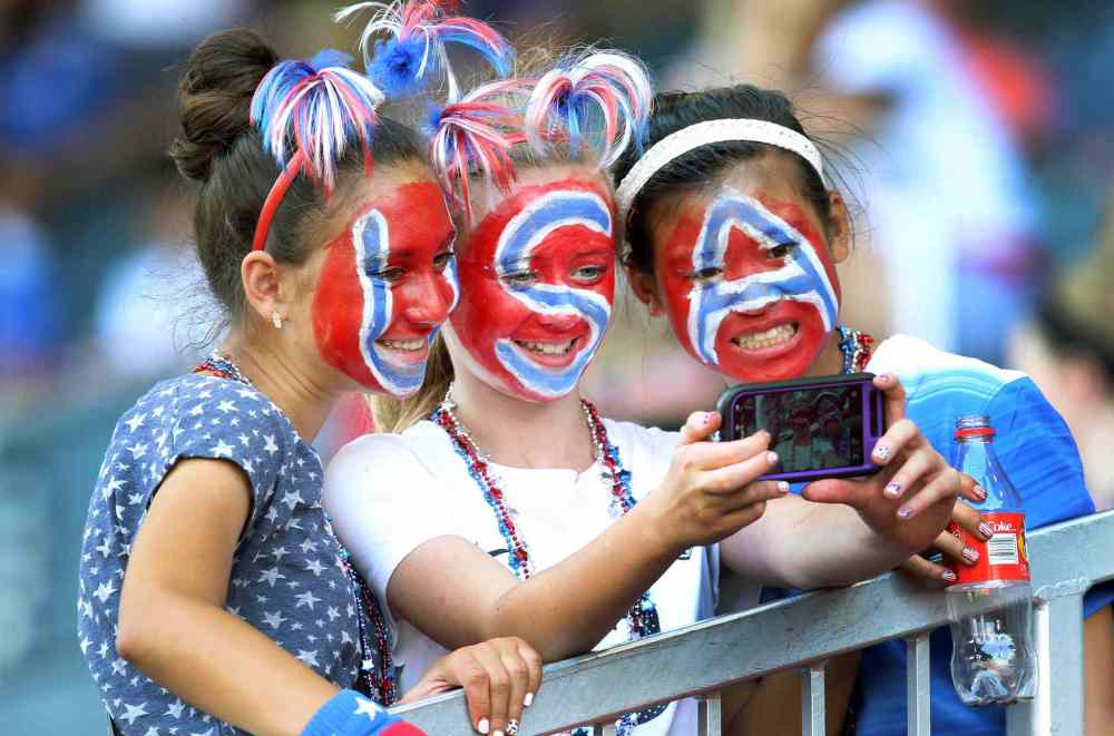 USA fans take a selfie before the FIFA Women's World cup game between team Nigeria and Australia at Investors Group Field. June 12, 2015 (JOE BRYKSA / WINNIPEG FREE PRESS)