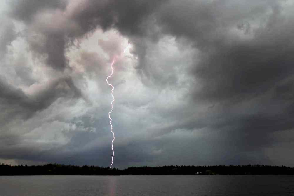 Lightning strikes behind Florence Lake in Whiteshell Provincial Park. June 27, 2015 (JOE BRYKSA / WINNIPEG FREE PRESS)