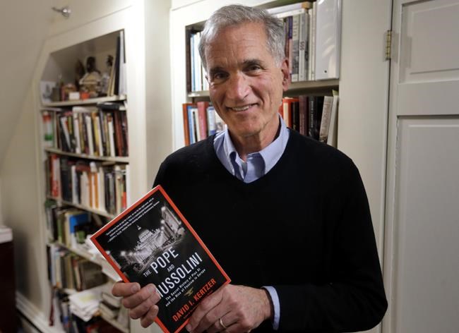 FILE - Brown University professor David I. Kertzer holds his book