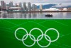 Police officers patrol the waters of False Creek by boat near the athletes village and GM Place in downtown Vancouver, Tuesday, Feb. 2, 2010. An Indigenous-led partnership is moving ahead with plans to host the 2030 Winter Olympics in Vancouver and Whistler. THE CANADIAN PRESS/Jonathan Hayward