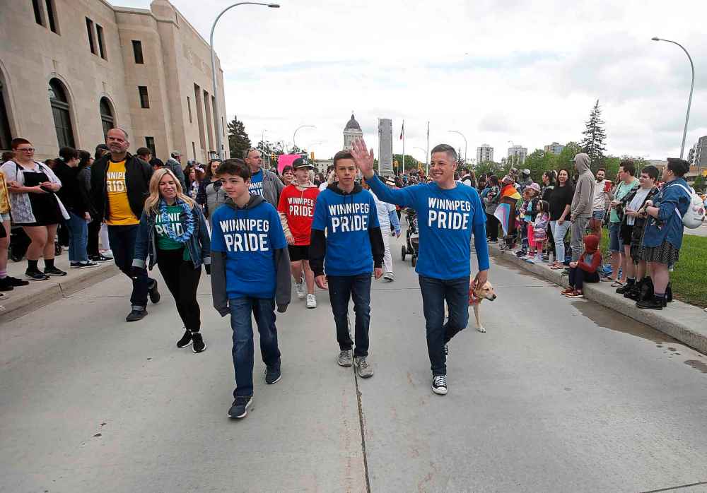 JOHN WOODS / WINNIPEG FREE PRESS
JOHN WOODS / WINNIPEG FREE PRESS
Mayor Brian Bowman (at right) takes part in the Pride Parade.