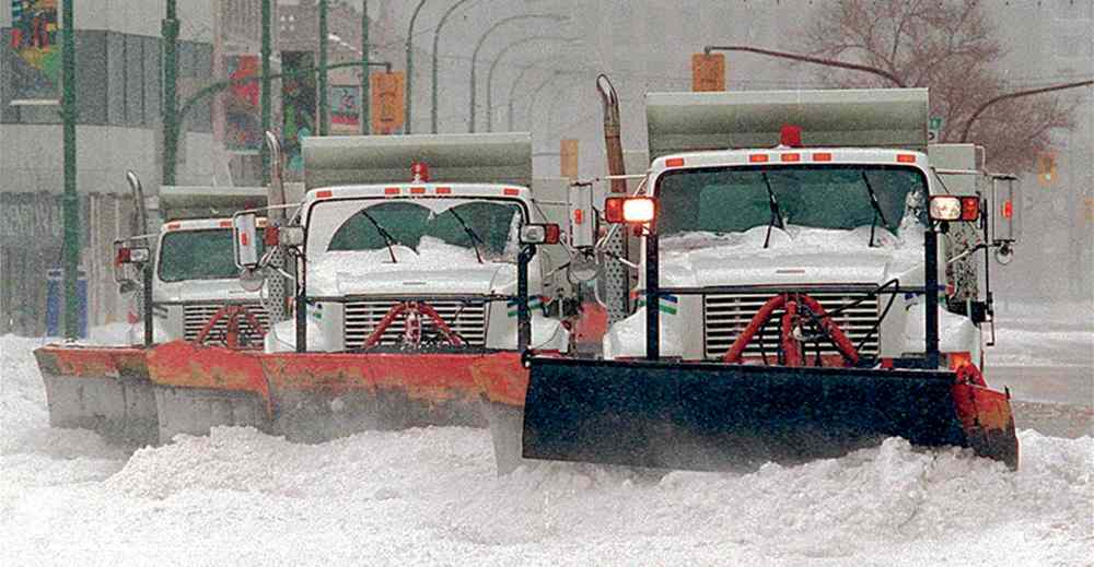 Portage Avenue was impassable on Sunday afternoon, April 6. (Jeff DeBooy / Winnipeg Free Press files)