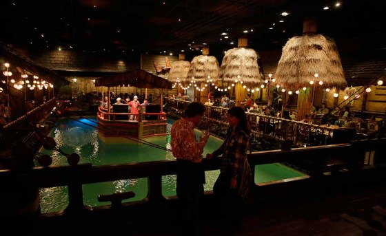 The Tonga Room, located in the Fairmont Hotel in San Francisco, dates to 1945 and is known for its frequent thunder, lighting, rainstorms and tropical drinks. (Eric Risberg / The Associated Press files)