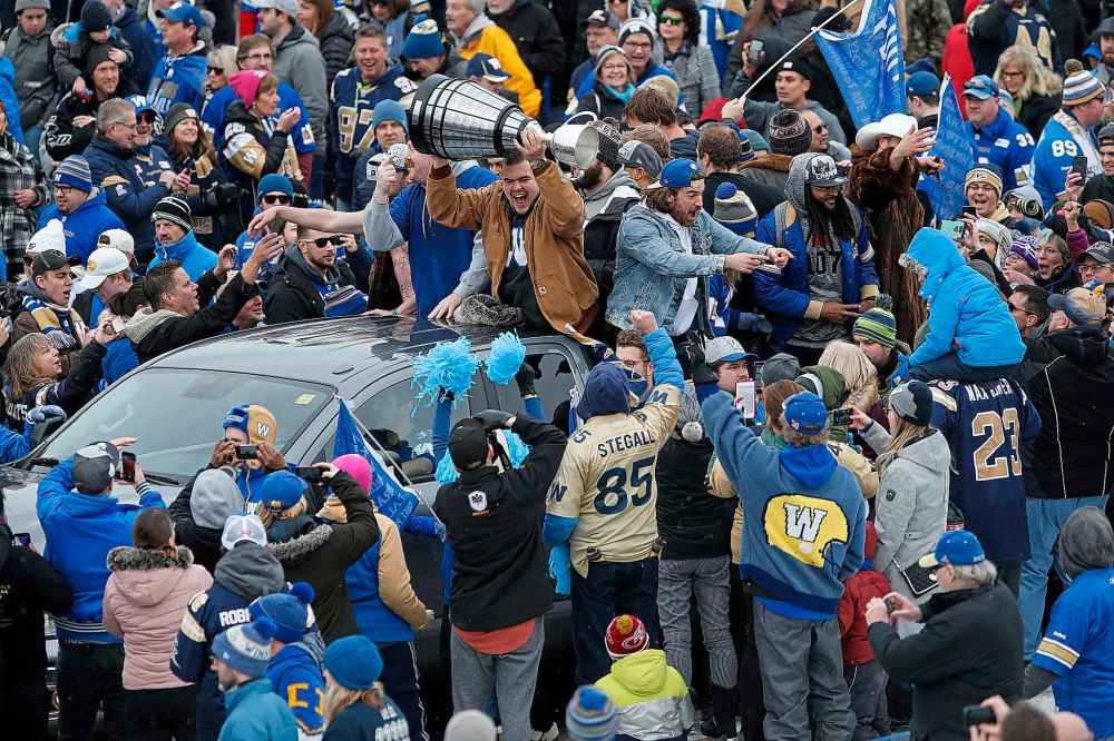 CP
Winnipeggers are crowding the downtown streets Tuesday, Nov. 26, 2019, to celebrate with players the end of a Grey Cup drought that lasted almost three decades. The city is hosting a parade this afternoon after the Winnipeg Blue Bombers won their 11th Grey Cup with a 33-12 victory over the Hamilton Tiger-Cats on Sunday in Calgary. THE CANADIAN PRESS/John Woods