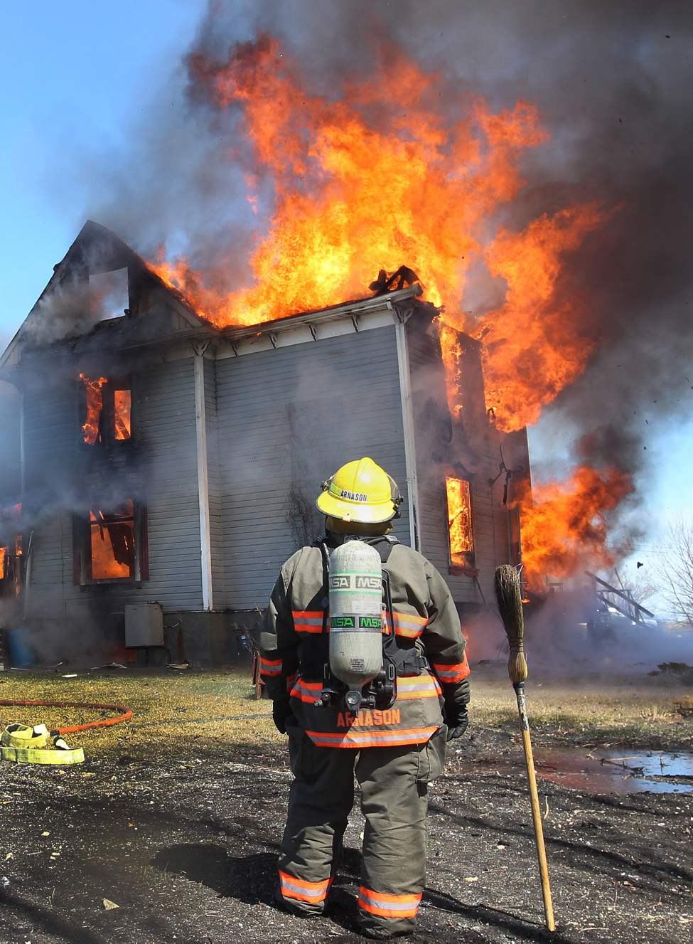 A firefighter who arrived as backup could only watch as flames engulfed a home to a total loss on Kapeulus Drive in West St. Paul.
Monday, April 16, 2012
(JOE BRYKSA / WINNIPEG FREE PRESS)