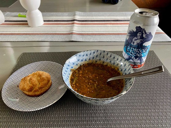 A mediocre photo of a fantastic lentil soup, paired with Stone Angel’s The Pirate Queen. (Ben Sigurdson / Winnipeg Free Press)
