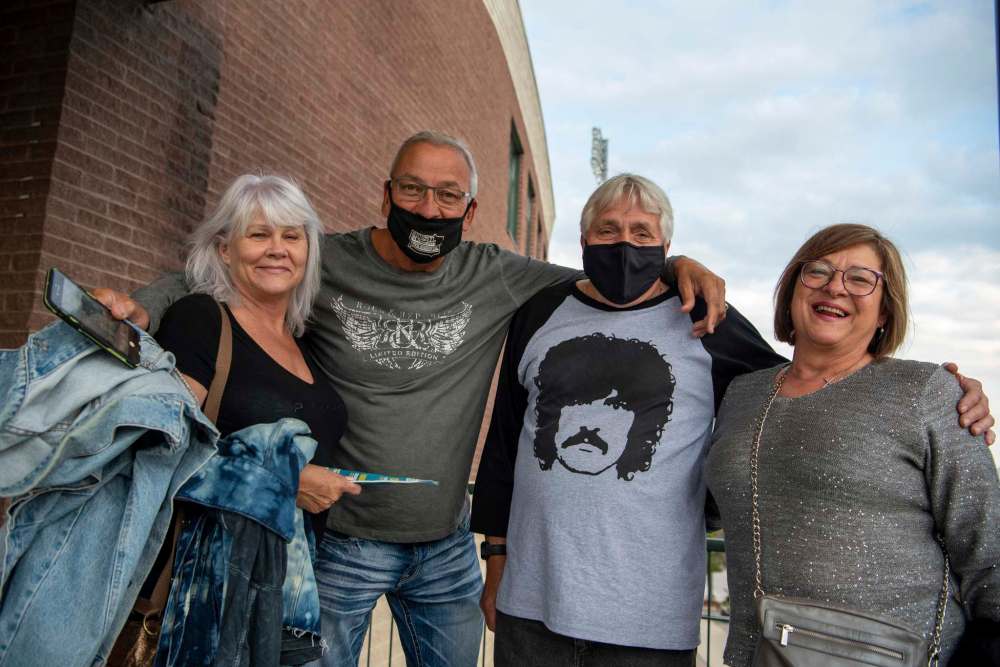 Brenda Kisil (left), Glenn Kisil, Hank Dewit and Cindy Dewit are excited for the Unite 150 evening concert featuring performers such as Kelly Bado, Begonia, Randy Bachman and Burton Cummings. (Alex Lupul / WInniepg Free Press)
