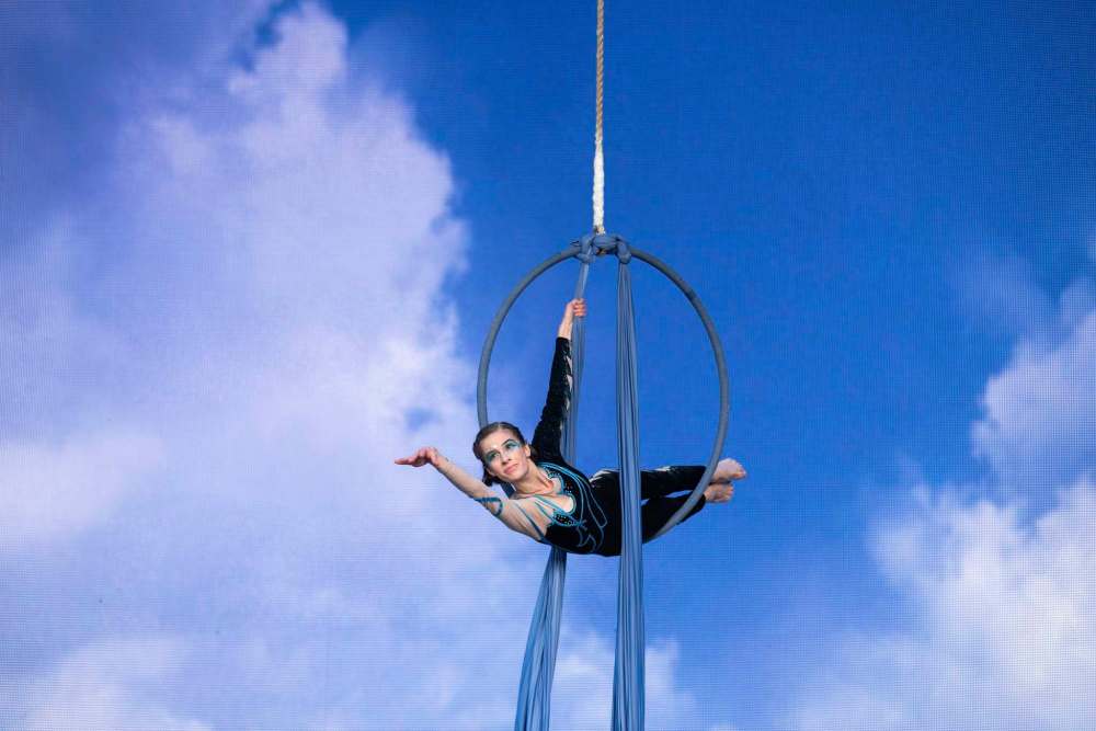 An aerial hoop artist performs during an episodic vision quest entitled the Seven Sacred Laws at Shaw Park during the concert. It was part of a two-hour intermission that was streamed online. (Alex Lupul / Winnipeg Free Press)