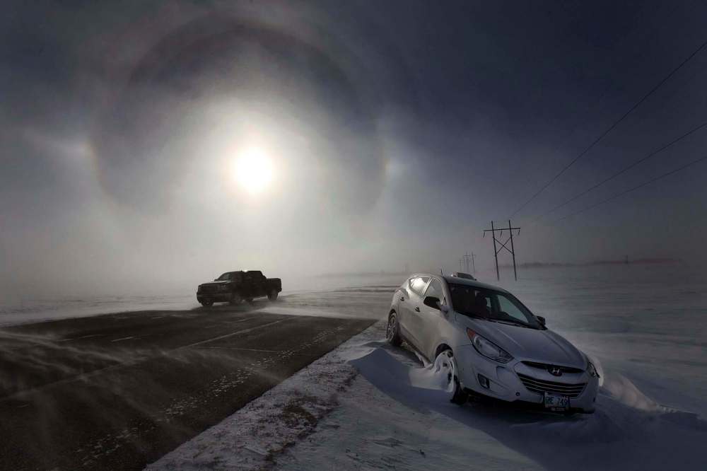 Abandoned vehicles litter Highway 3 on Jan. 12, 2017. (Phil Hossack / Winnipeg Free Press files)