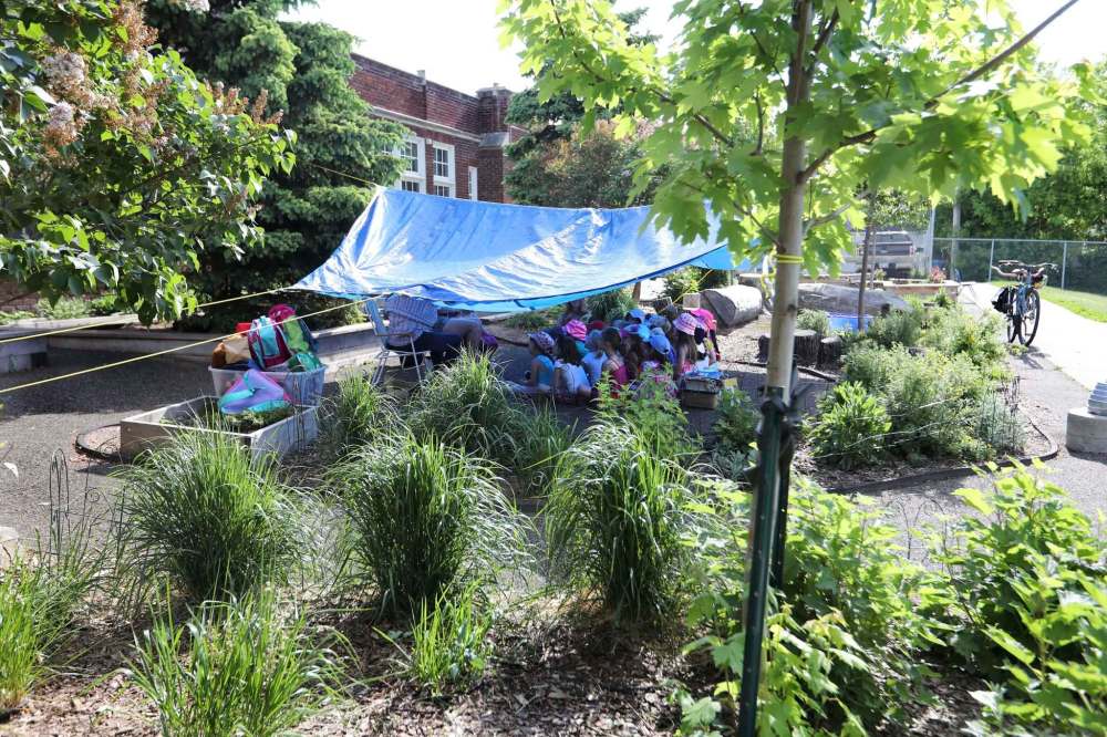 Wolseley students are taking all of their classes outside for two weeks — rain or shine. A tarp offers relief to Week 1’s warm and sunny weather.