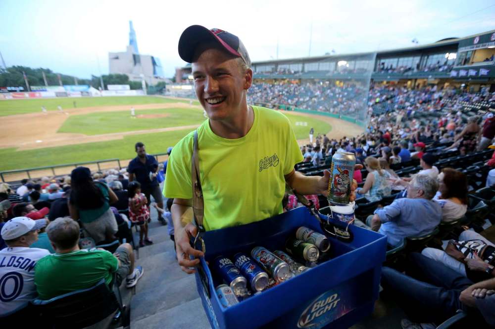 Jakob Sanderson, 21, selling beer during the Goldeyes game.