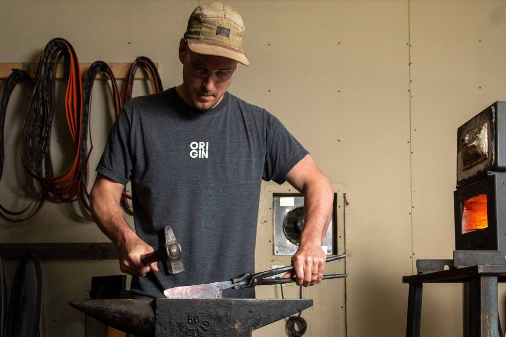 The anvil is an essential piece of equipment for Marc Liss. (Ethan Cairns / Winnipeg Free Press)