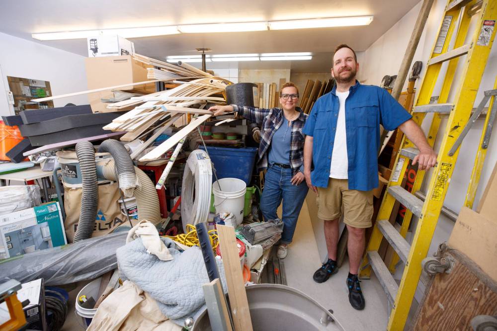 MIKE DEAL / WINNIPEG FREE PRESS
Winnipeg siblings Heather and Nathan Porteous buy the homes of hoarders, clean them out, fix them up and the flip them for profit, and for their show, Hoarder House Flippers on HGTV.