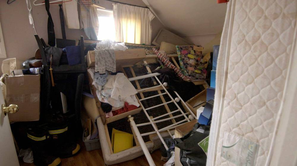 supplied
Before: The living room benefits from the Hoarder House Flippers’ routine.