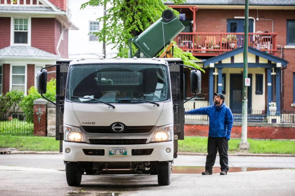 MIKAELA MACKENZIE / WINNIPEG FREE PRESS
Instead of collecting pails from doorsteps, or wheeling heavy bins sometimes entire blocks to tip them into the truck, Garrett LeBlanc envisions a curbside collection system much like what already exists for garbage and recycling.
