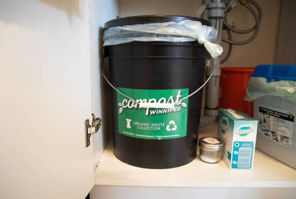 JESSICA LEE / WINNIPEG FREE PRESS
Laura Gow says she was struck by the extra waste in her trash after she moved into the city. Nowadays, she composts simply because it puts that waste to better use than the landfills.