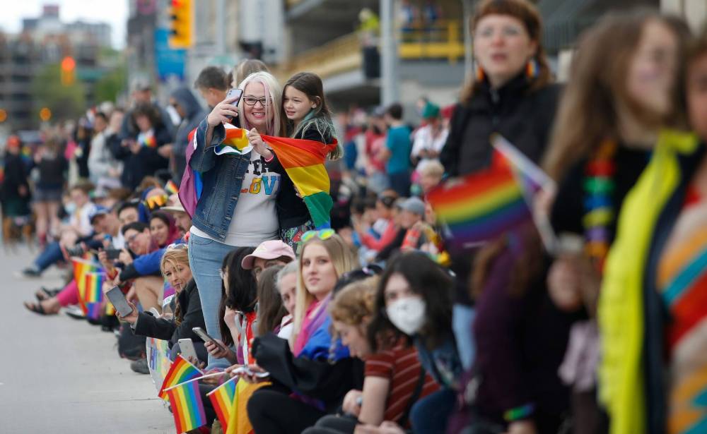 Thousands of spectators lined the route of Sunday's Pride Parade. (John Woods / Winnipeg Free Press files)