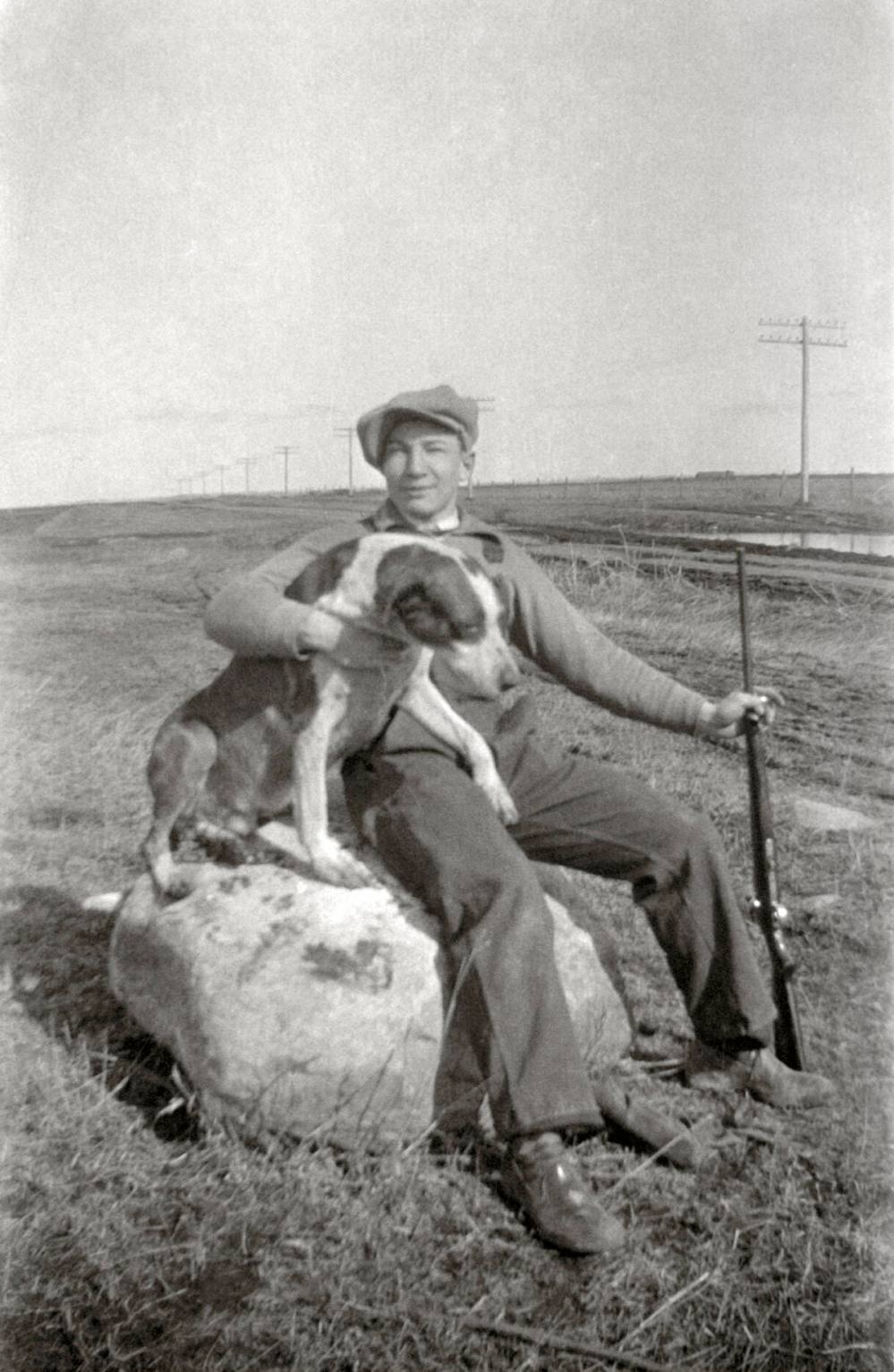 NICK YUDELL PHOTO
Victor Burgess and dog Pat, a half mile west of Morden, 1932.