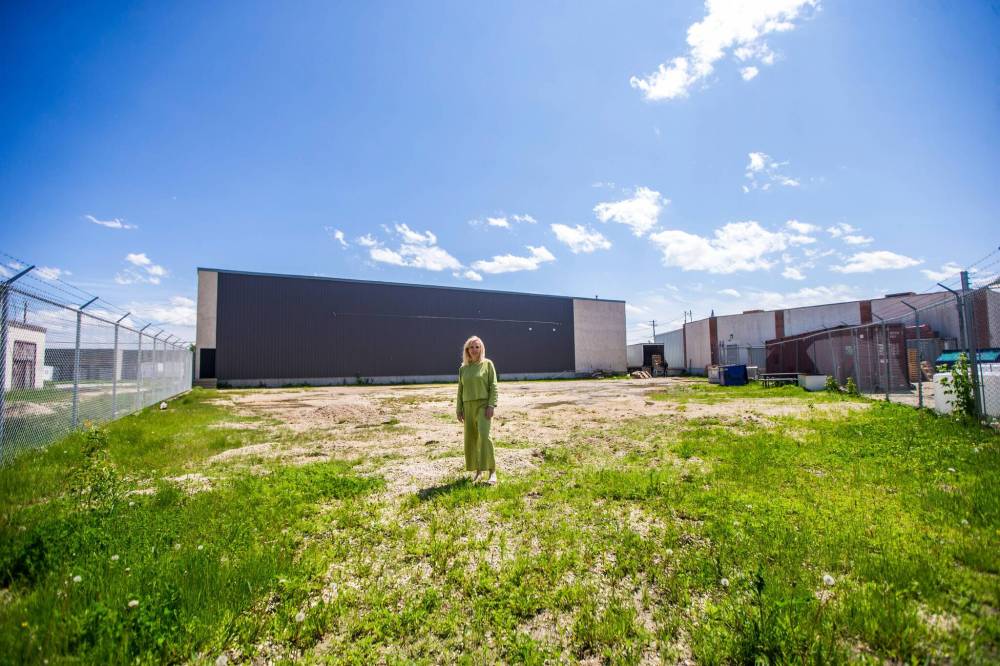 MIKAELA MACKENZIE / WINNIPEG FREE PRESS
Janeen Junson, owner of Artists Emporium, in the back lot of their new location in Winnipeg.