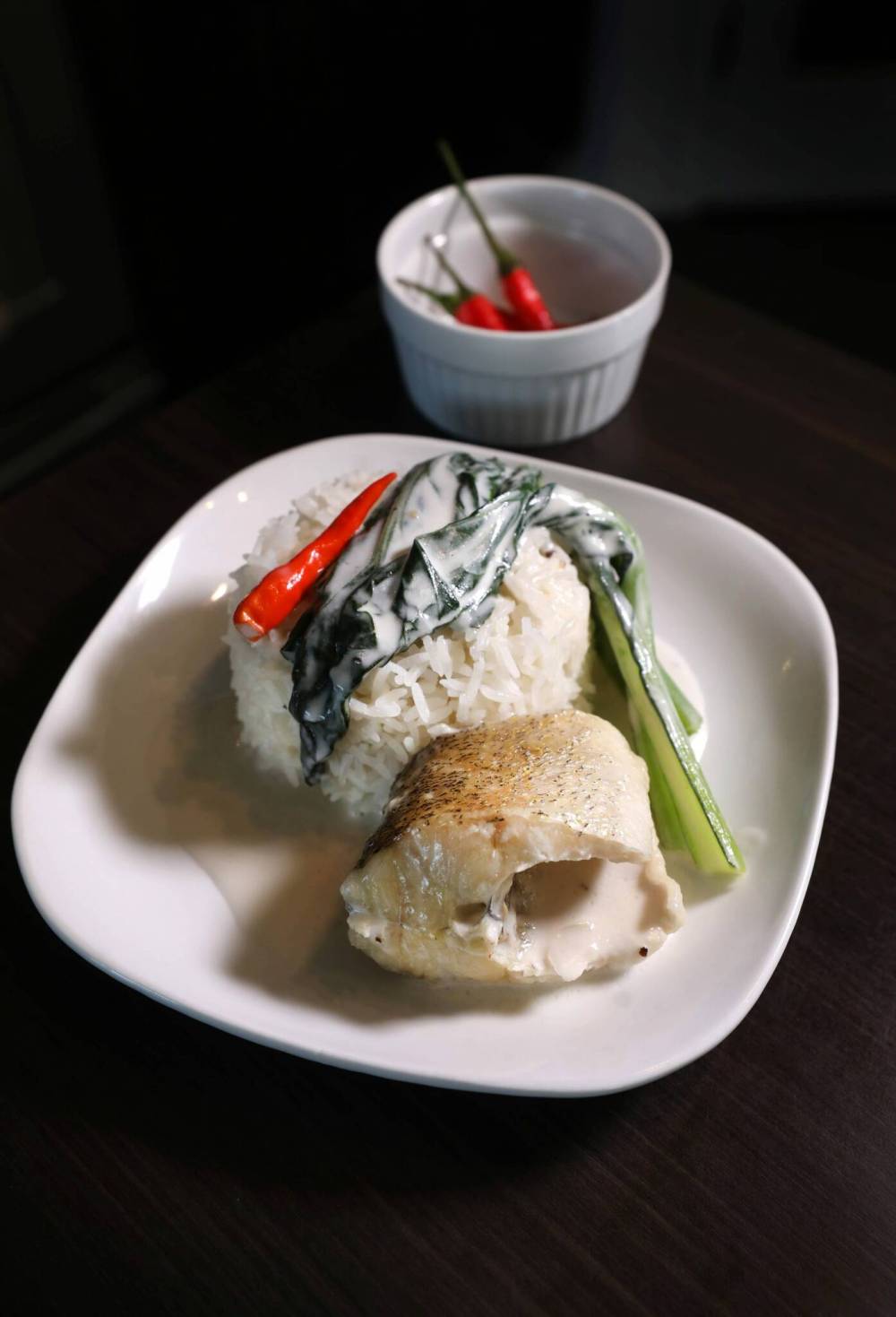 RUTH BONNEVILLE / WINNIPEG FREE PRESS
In the Philippines, Ginataan na Isda — which means ‘done with coconut milk’ in Tagalog — is typically made with milkfish or tilapia poached in coconut milk and aromatics.