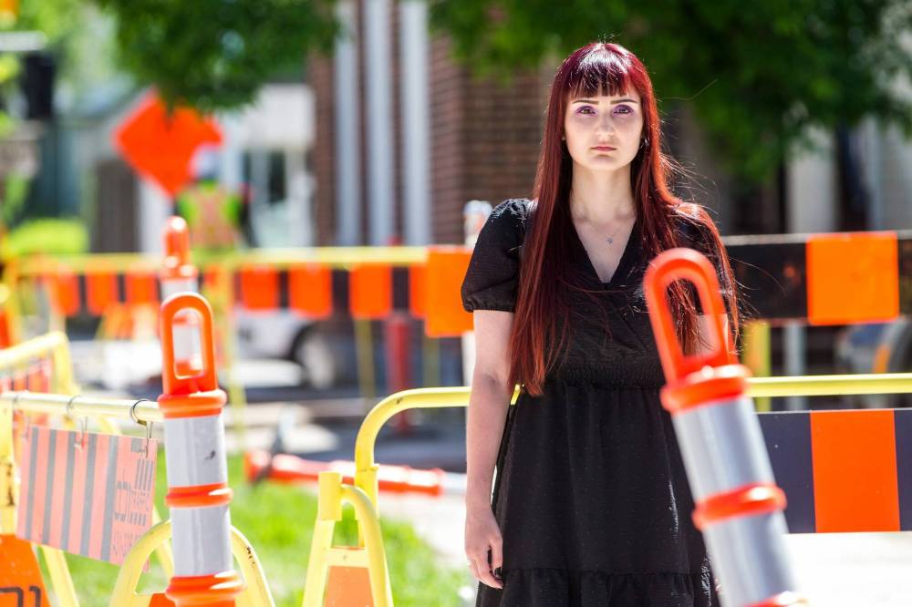 Rimah Bhabha has been encountering a huge sidewalk blockage on her way to work along Westminster Avenue for weeks. Bhabha says her community’s less mobile are disproportionately affected by losing the walkway for so long. (Mikaela MacKenzie / Winnipeg Free Press)