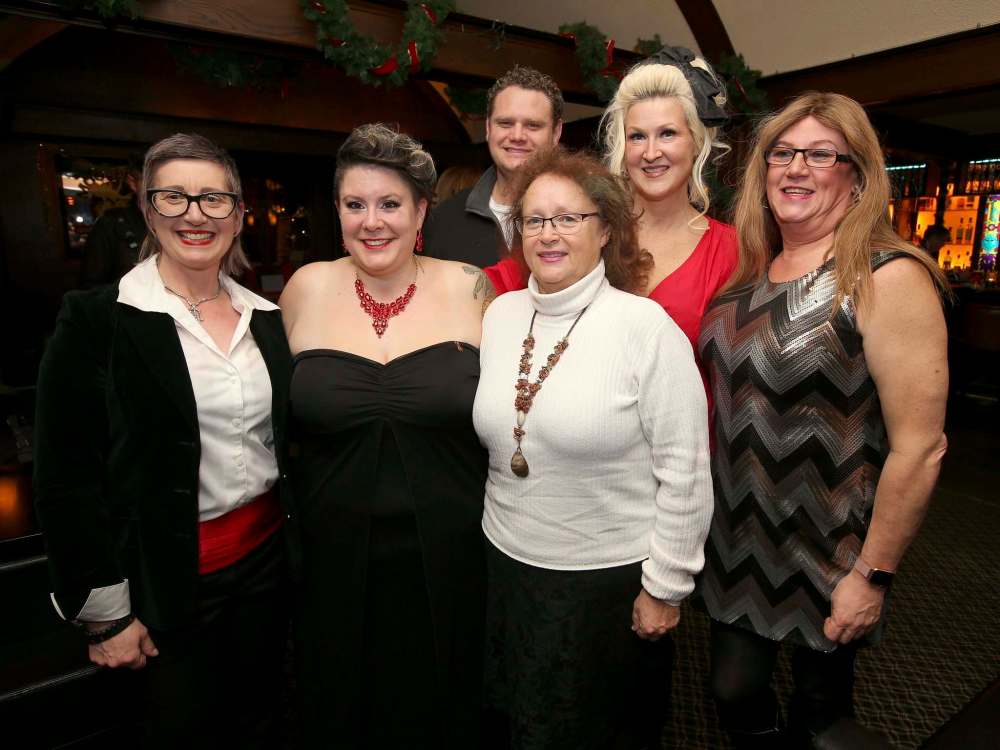From left: Rayne Foy-Vachon (clinic co-ordinator, Nine Circles), Erica Pastetnik, Kevin Jardine, Cherie Jardine, Barbie Rudiak (Manitoba LGBT* Chamber of Commerce) and Cynthia Fortlage (board president, Rainbow Resource Centre). (Jason Halstead / Winnipeg Free Press)