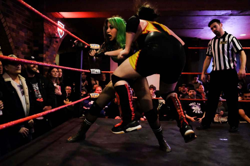 Shotzi Ryan delivers an elbow to her opponent.