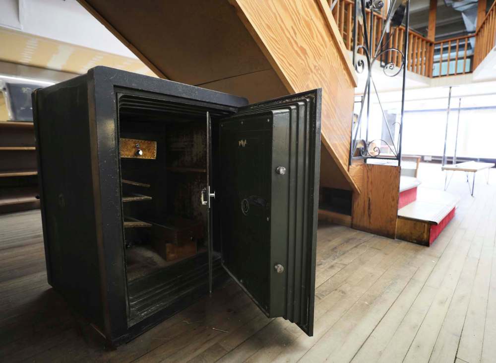 A large antique safe left behind in store.