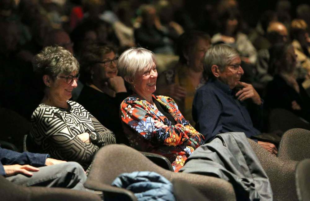 Attendees listen to the political panel.