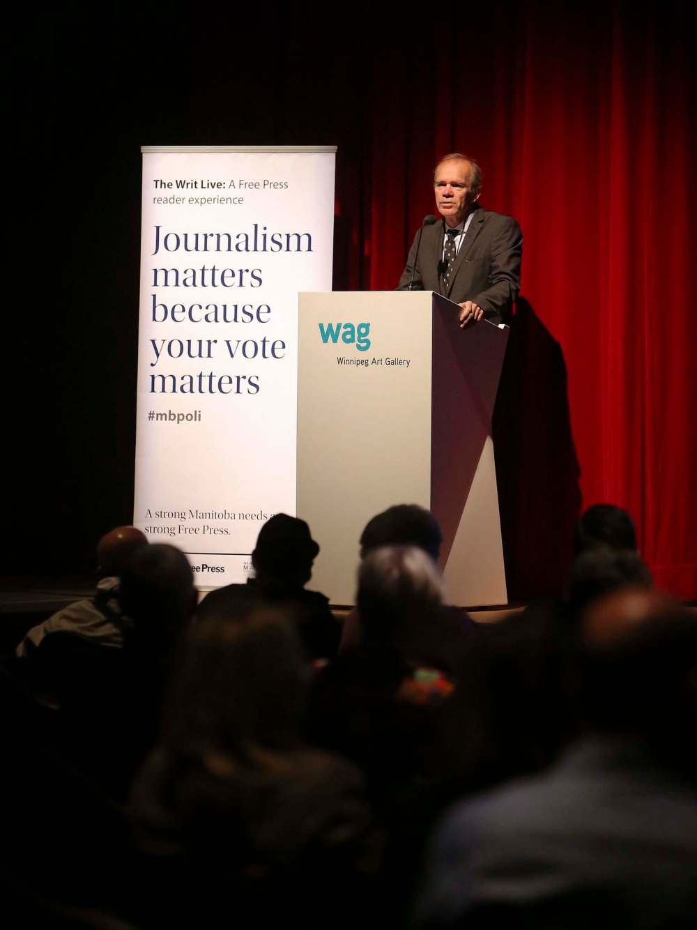 Free Press publisher Bob Cox speaks to the audience at the Writ Live event.