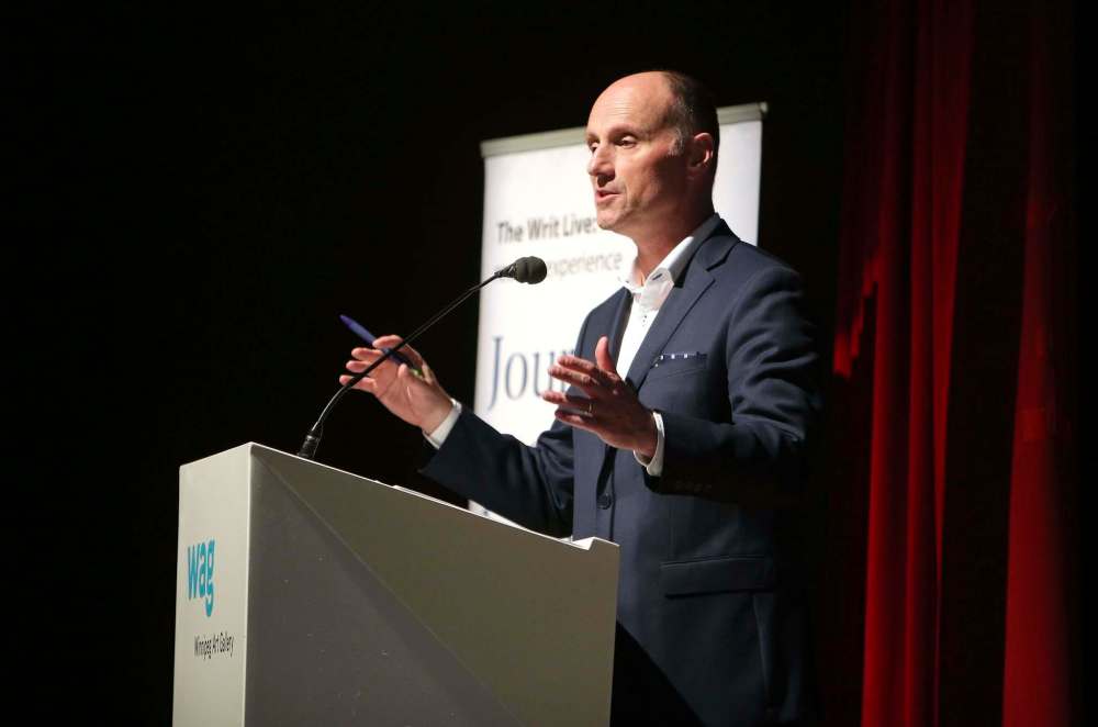Free Press editor Paul Samyn speaks to attendees at the Writ Live event.